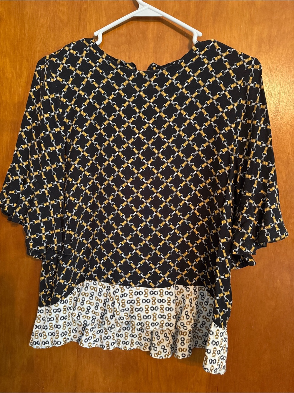 Zara Black and Gold Equestrian Patterned Women’s Top with Ruffle Hem